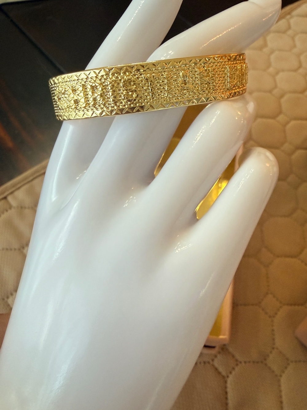 Dior Gold 'Christian Dior' Embossed
Logo adjustable cuff Bracelet. EUC
Stunning